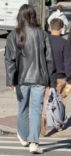 bag with a black leather trench coat